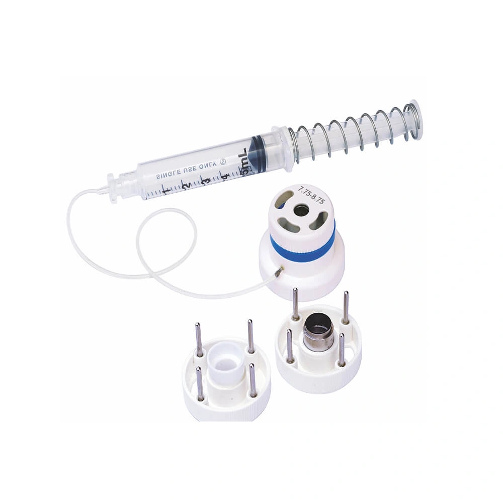 Jacob CAIRS trephine kit with vacuum syringe and cutting components, photographed by Madhu Instruments.