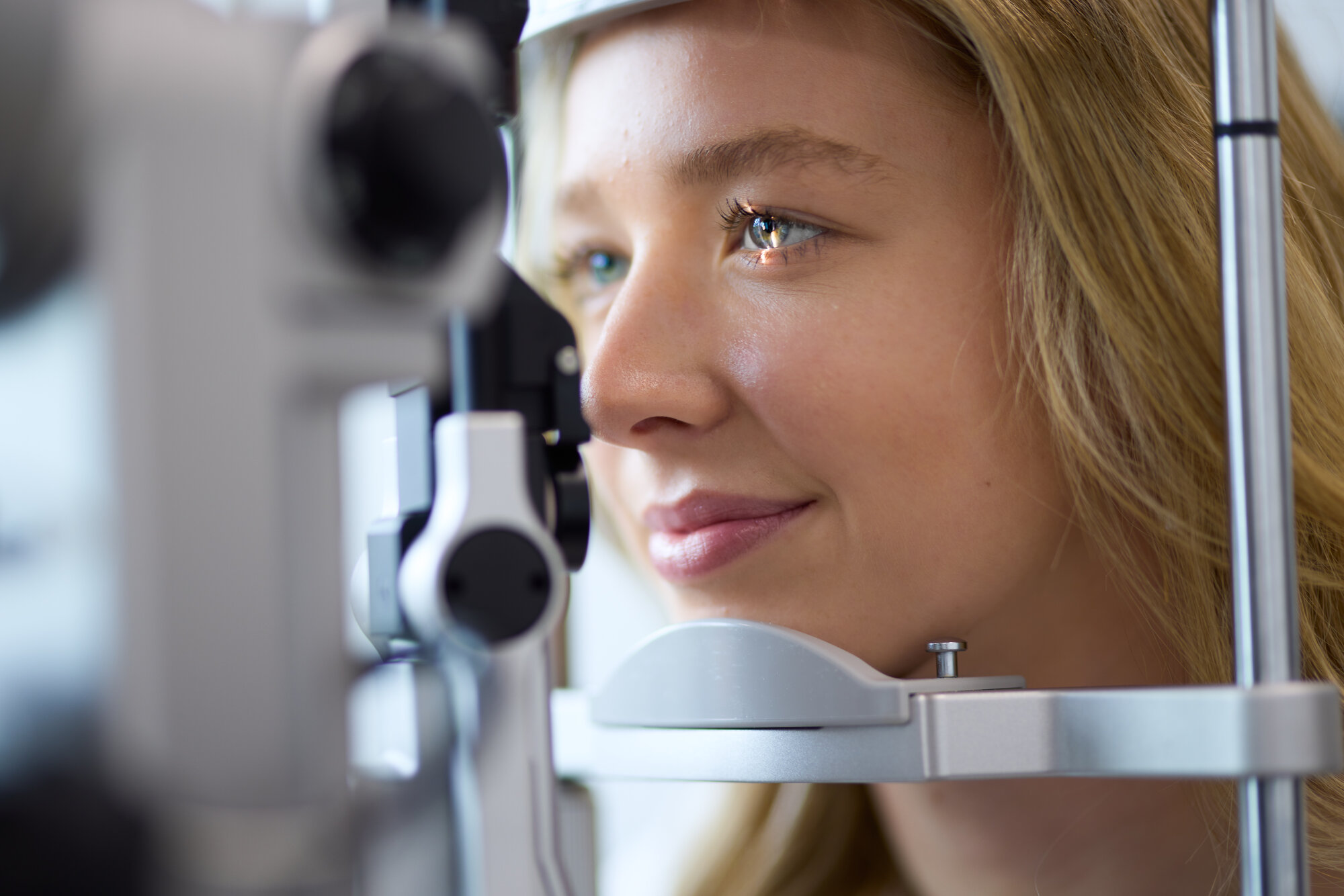 Patient receiving a slit-lamp examination